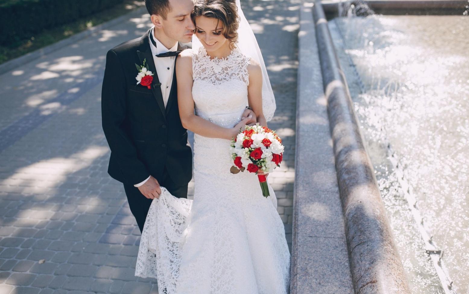 Beautiful wedding ceremony setup with elegant floral arrangements and lighting